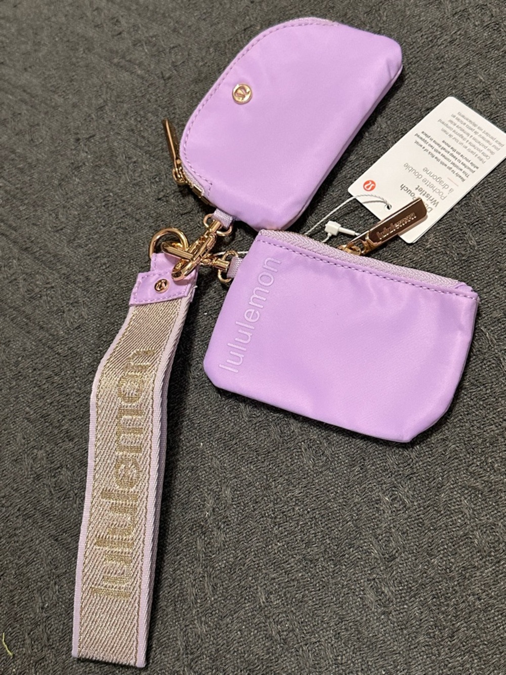 Lululemon lavender dual pouch wristlet with gold accent